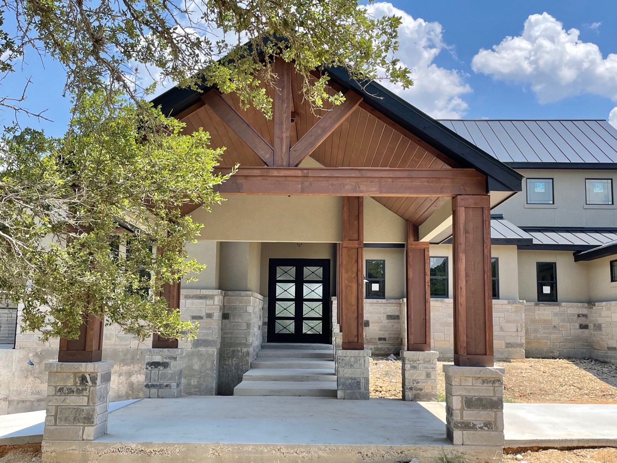 comal county custom home build grand entrance